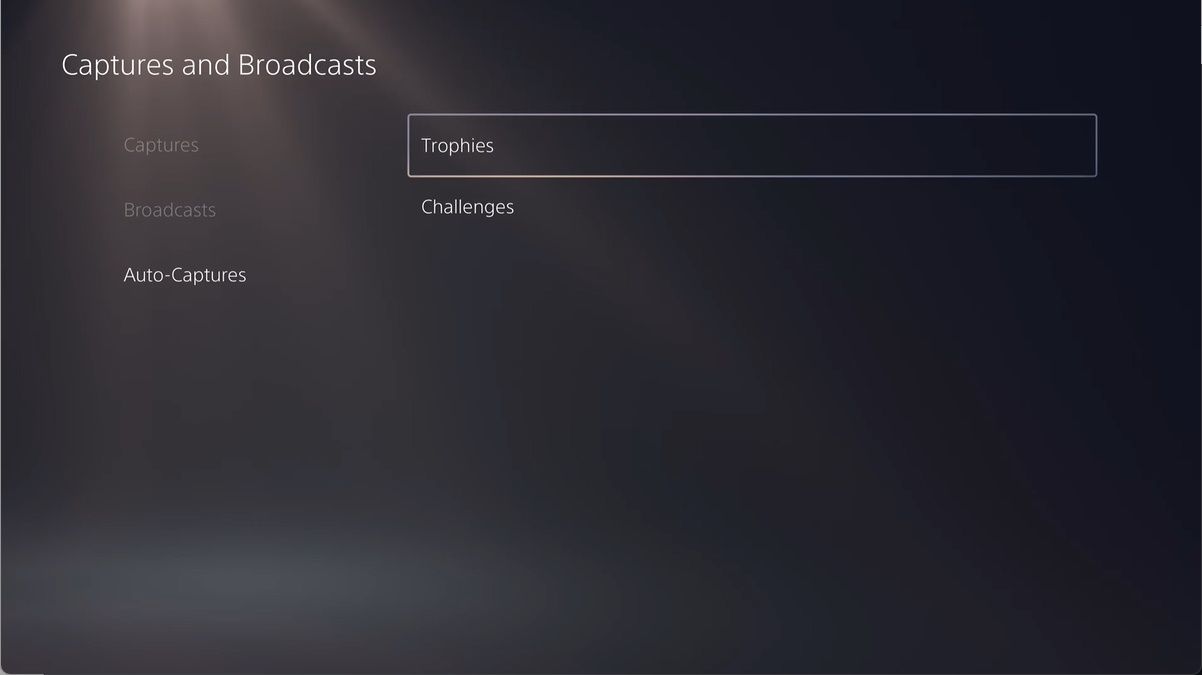 the captures and broadcasts screen in the PS5 settings and the trophies option has been highlighted