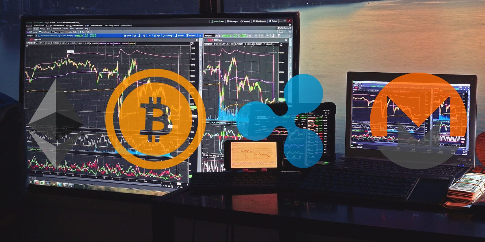 Ethereum, Bitcoin, Ripple, Monero logos seen over a photo showing trading graphs on computers
