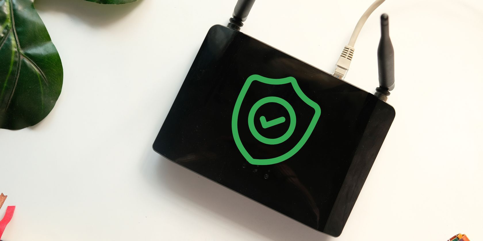 Black router with a security symbol