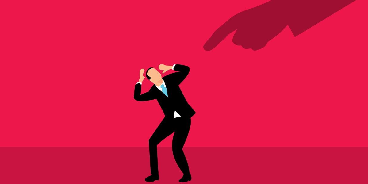 illustration of businessman cowering while hand points at him