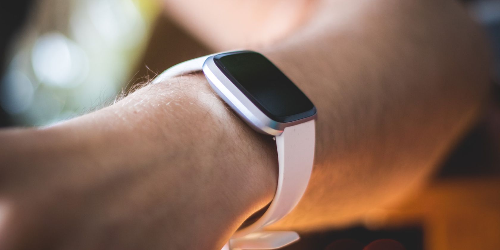Fitbit Versa watch on a wrist