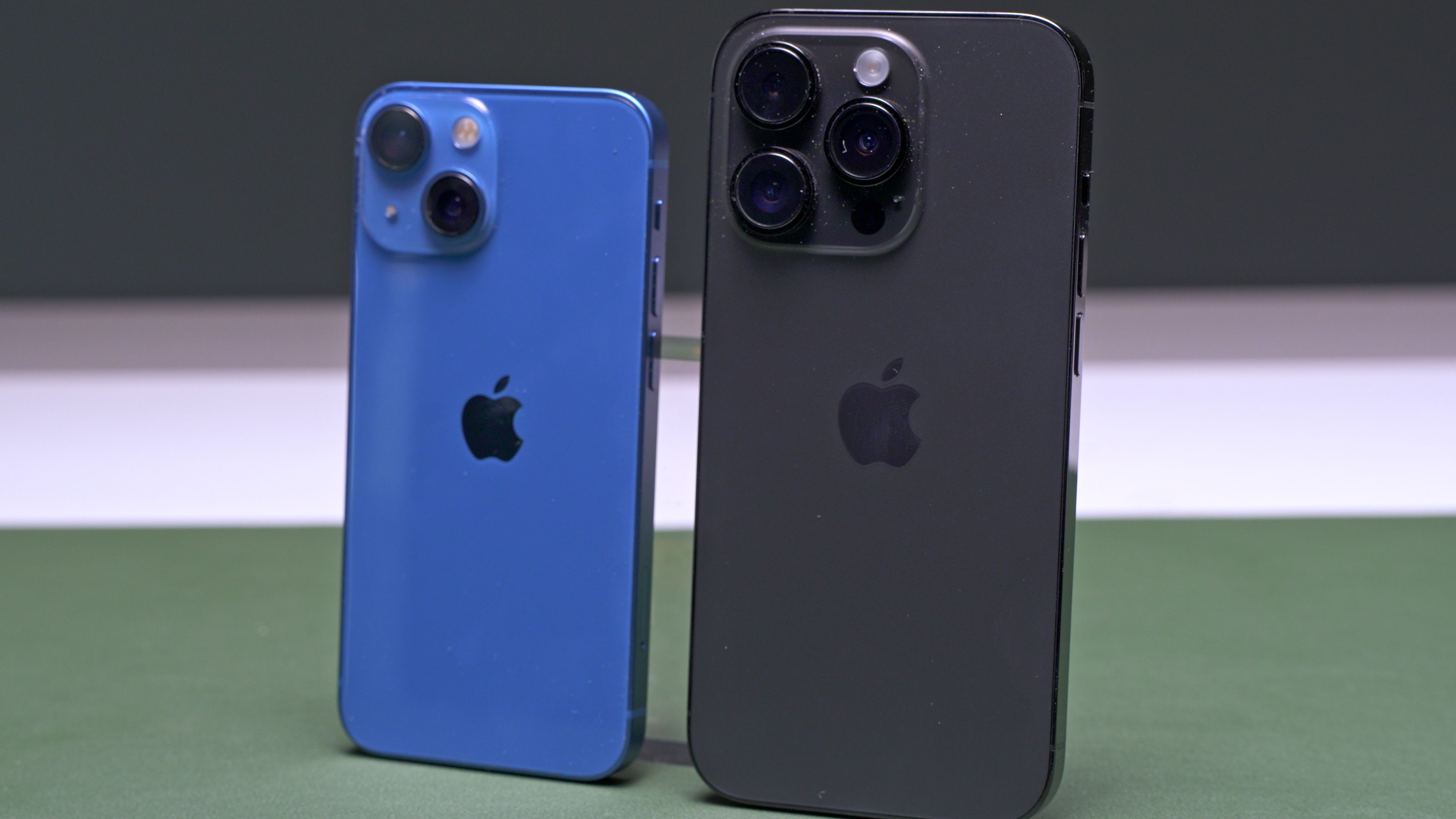 Back view next to iPhone 14 Pro - iPhone 13 Mini