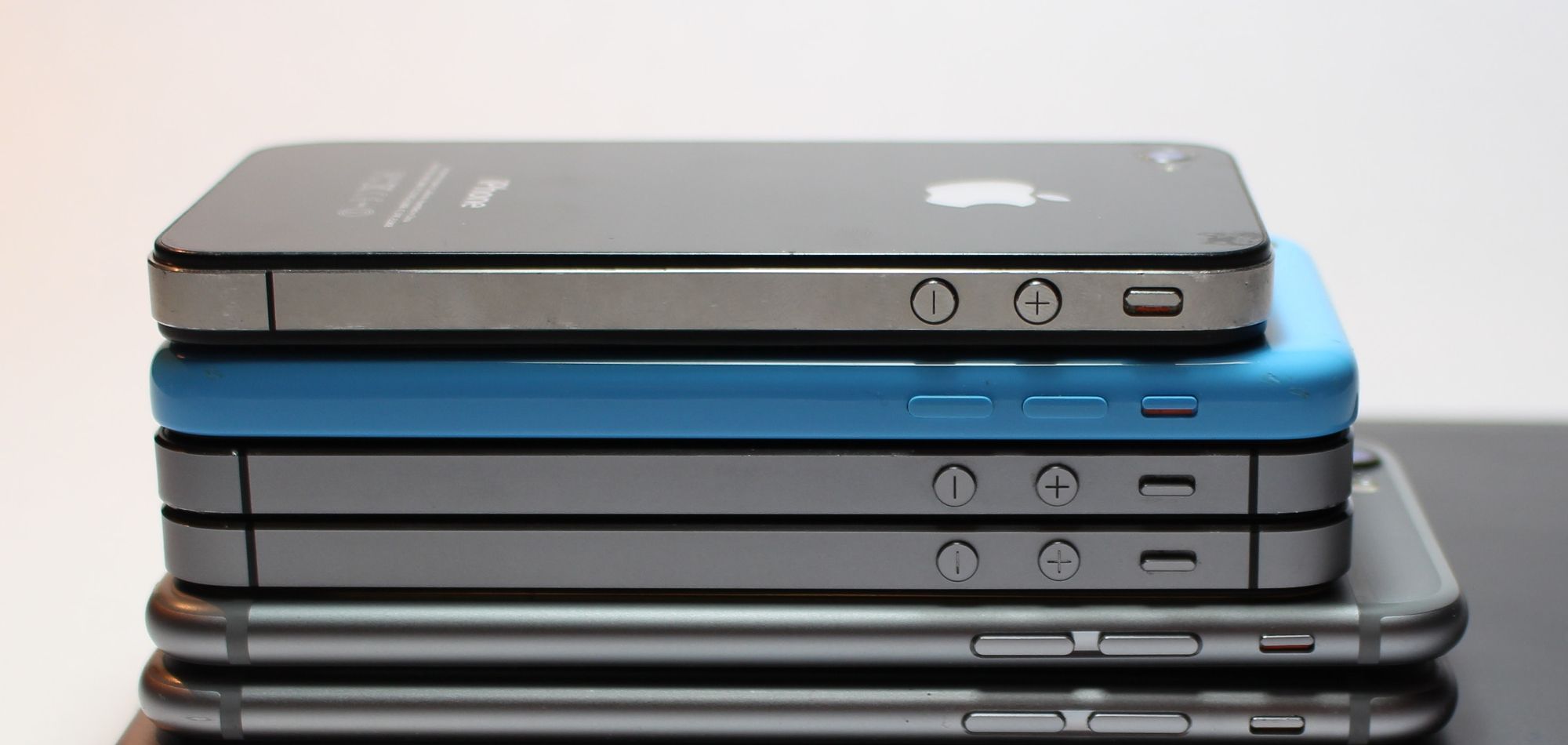 A stack of different iPhone models
