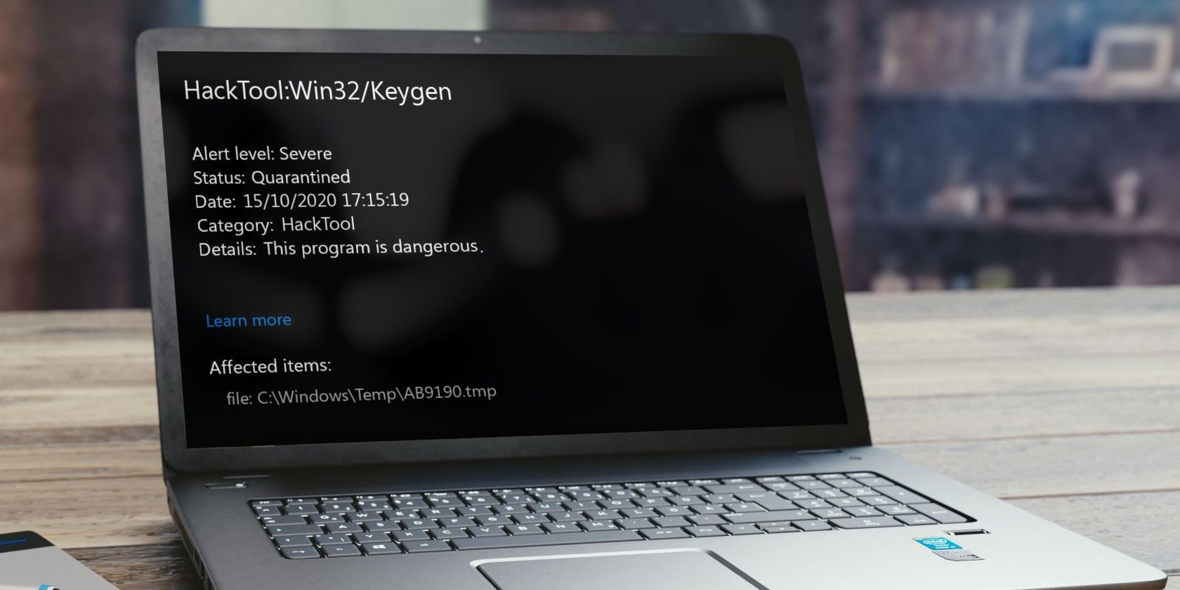Mockup of a Laptop Showing the HackTool:Win32/Keygen Malware in Windows Defender Protection History