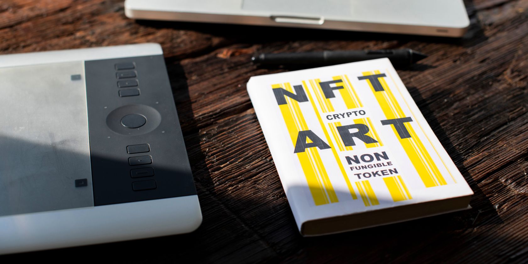 nft paper art book on wooden table feature