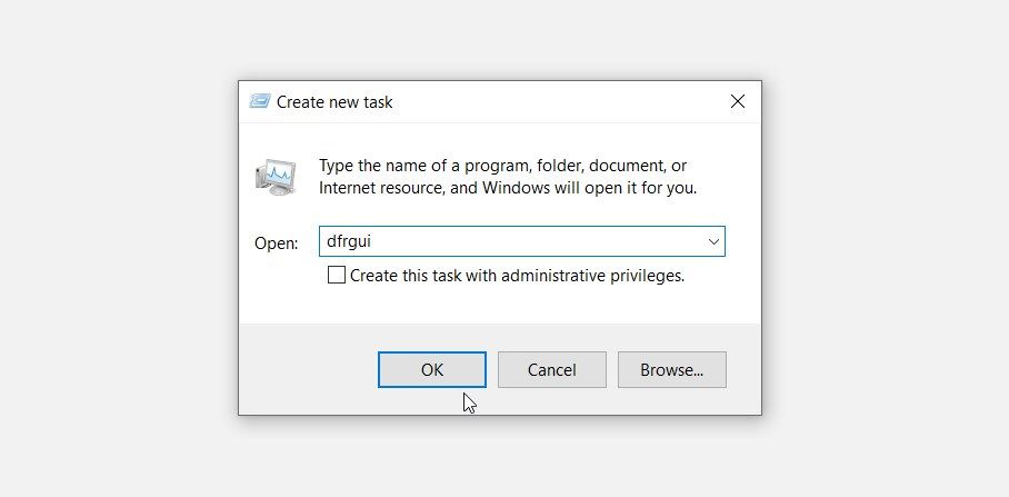 Opening the Disk Defragmenter app using the Task Manager