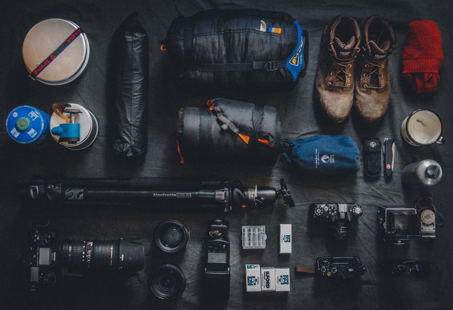 Camera equipment laid out on a carpet