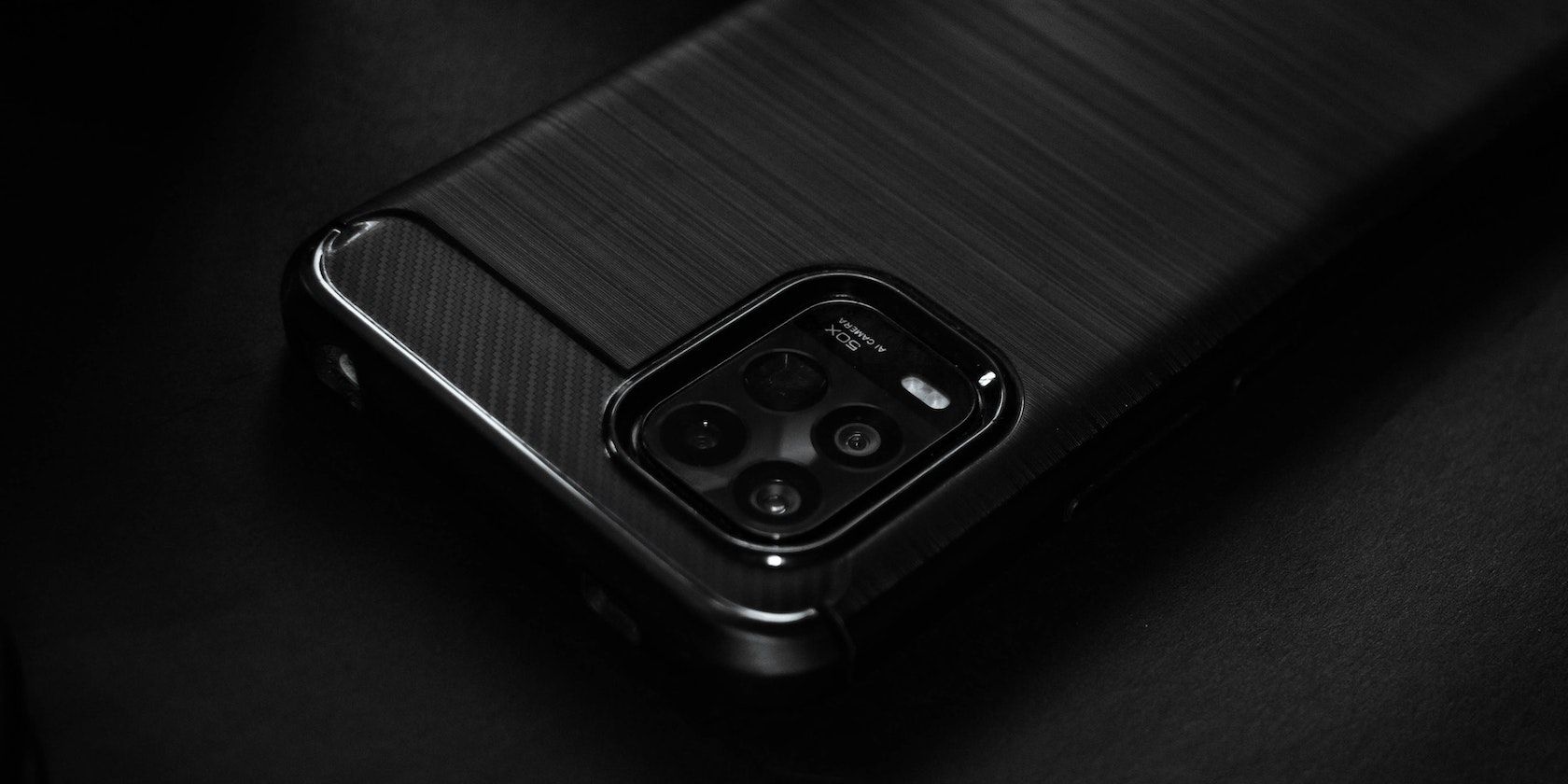 Photo of a Black Phone on a Black Surface