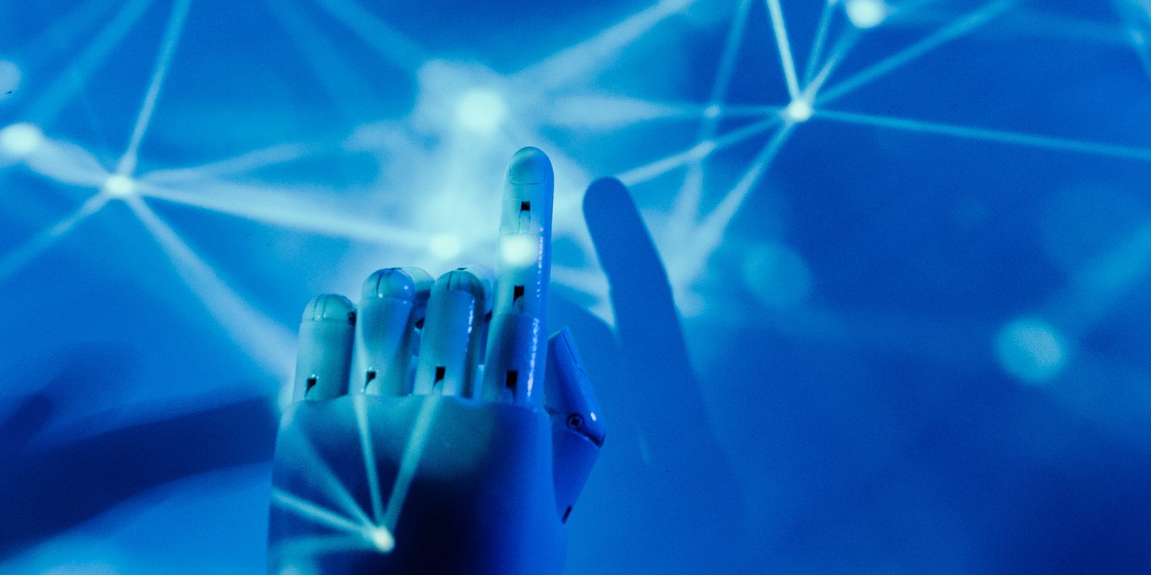Robotic hand pointing at blue lights