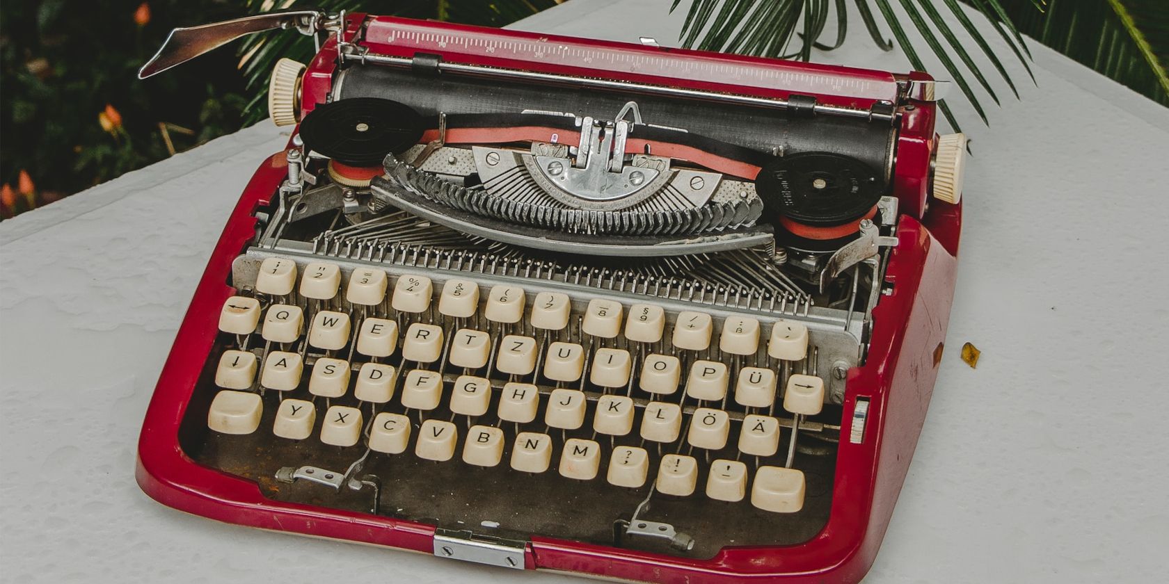 Red Typewriter on Table