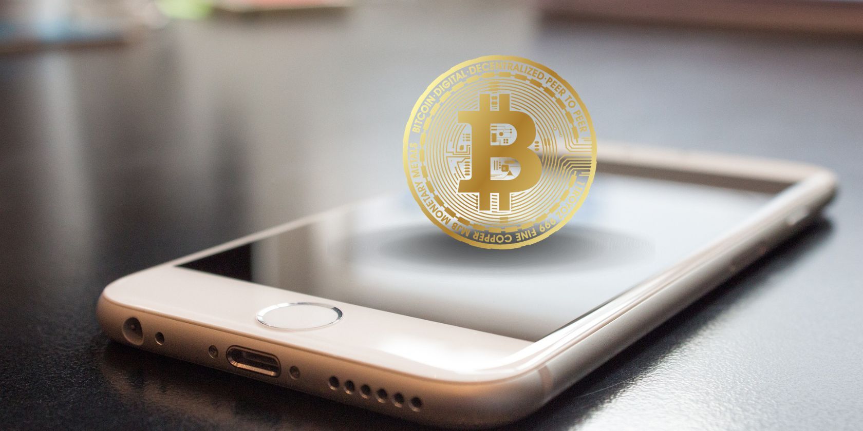 Smartphone with a 3d Bitcoin logo 