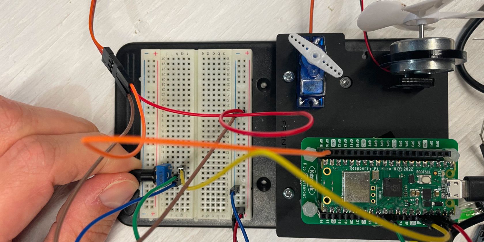 A Raspberry Pi Pico connected to components on a breadboard