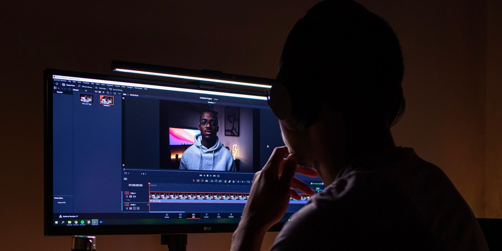 photo of a person editing a video
