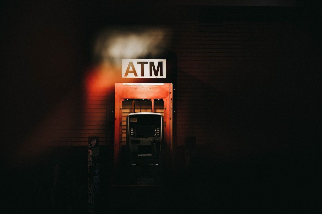 Shot of an ATM at night.