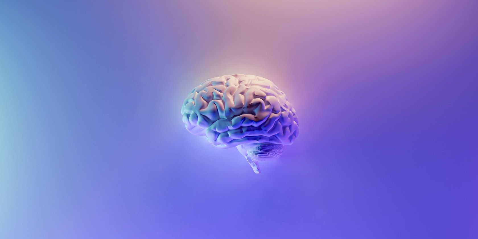 A digital render of a brain on a glowing purple background