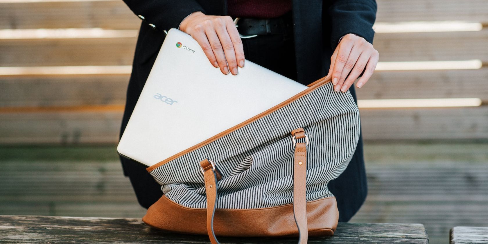 chromebook being put into a bag