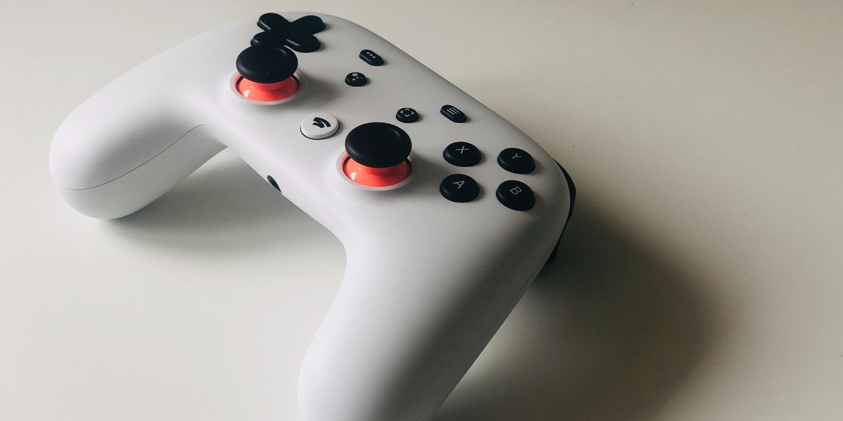 Close up of Google Stadia controller on white table