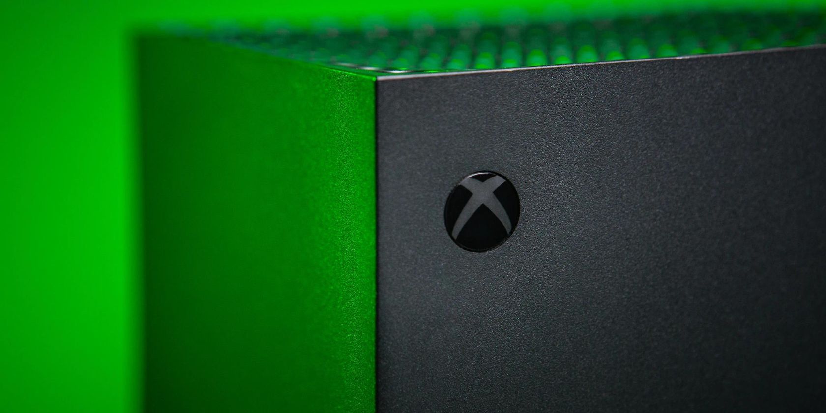 A close-up of the Xbox logo on the Xbox Series SX console