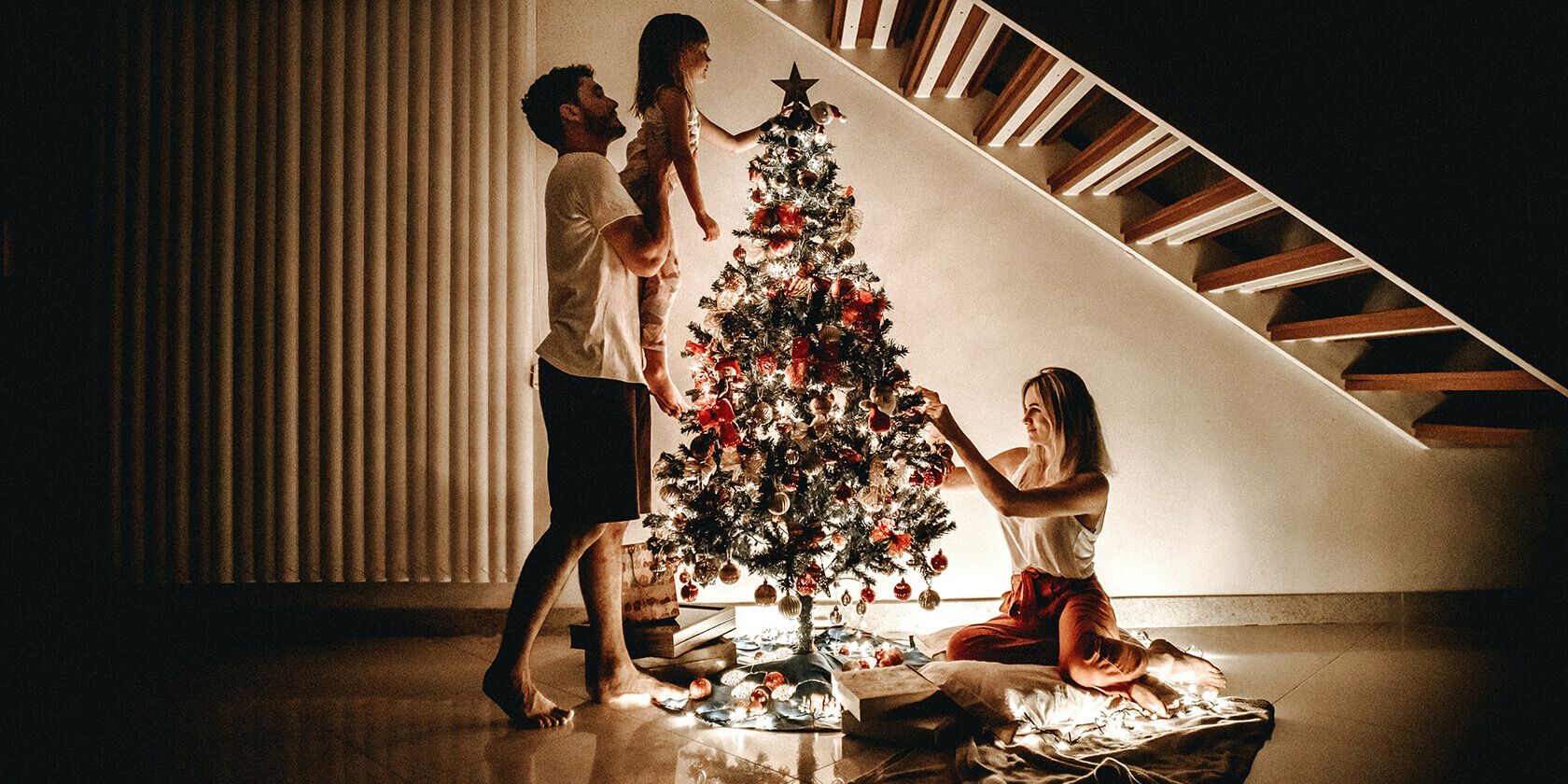 family around a christmas tree