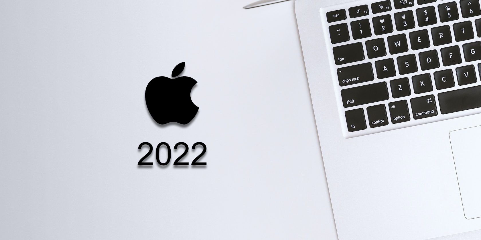 Feature image of MacBook with Apple logo and 2022 underneath