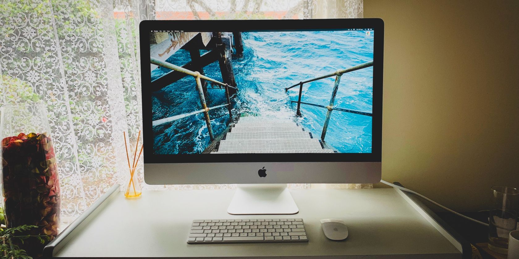 Silver iMac With Immersive Display on Home Work Desk