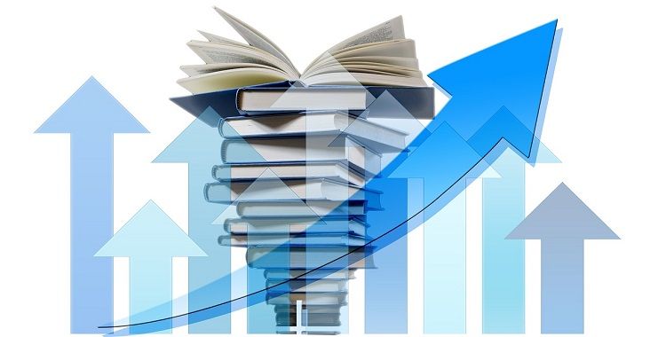 Image of books and arrows pointing upwards indicating progress