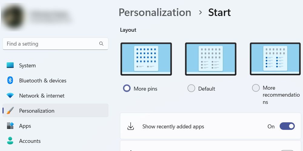 the layout section of the windows 11 personalization settings with the more pins option highlighted