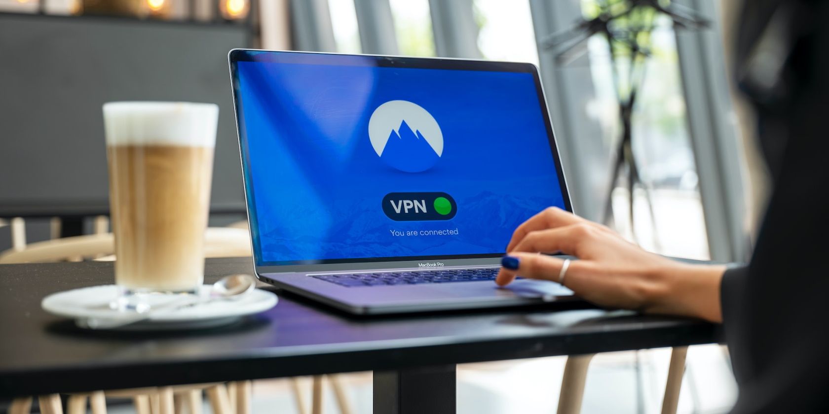 A woman using a VPN tool on her laptop