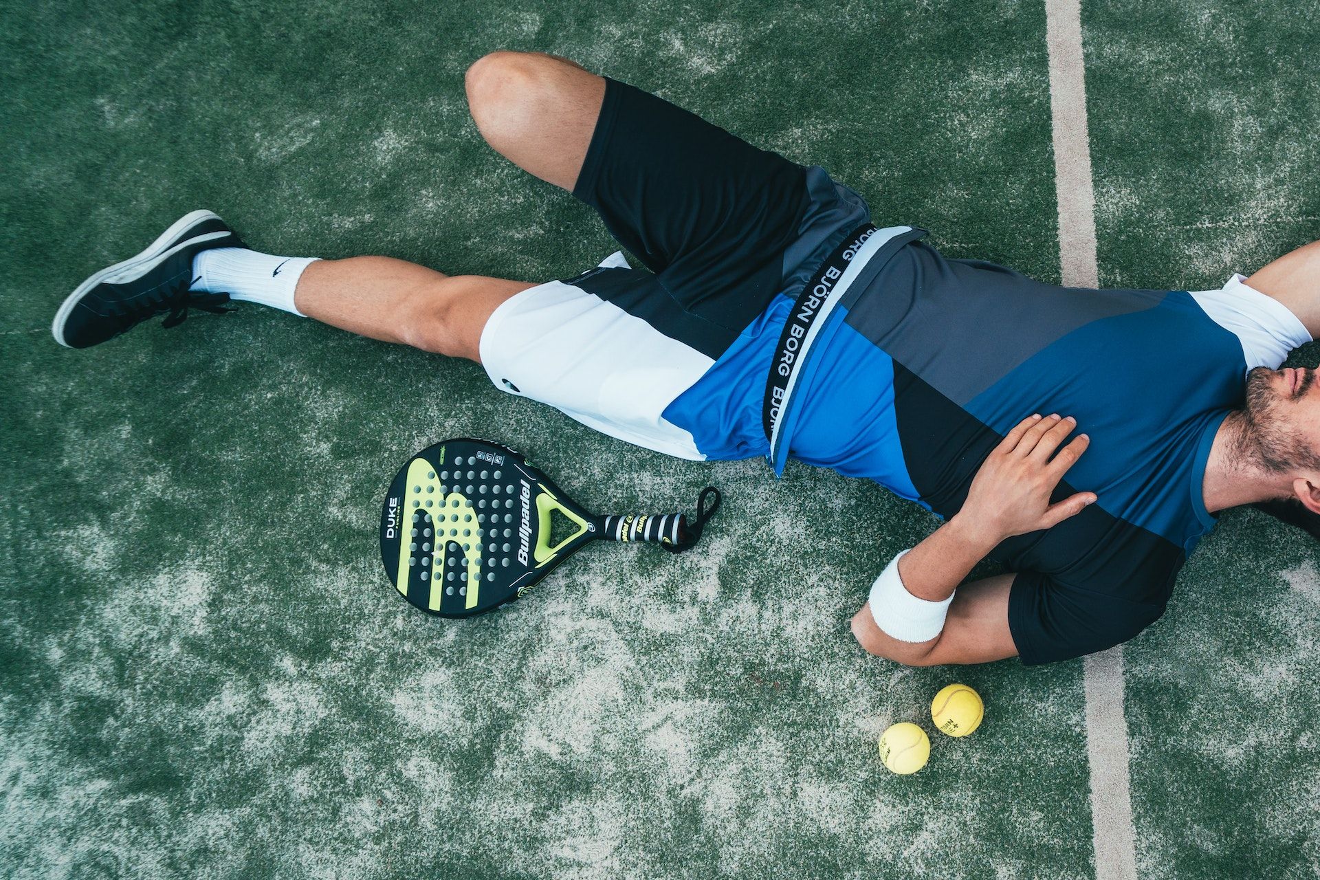 Tennis Player Lying Down