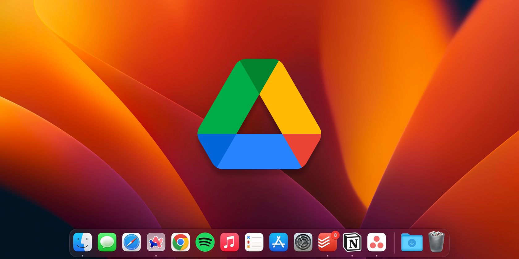 Google Drive logo on Mac desktop with Dock