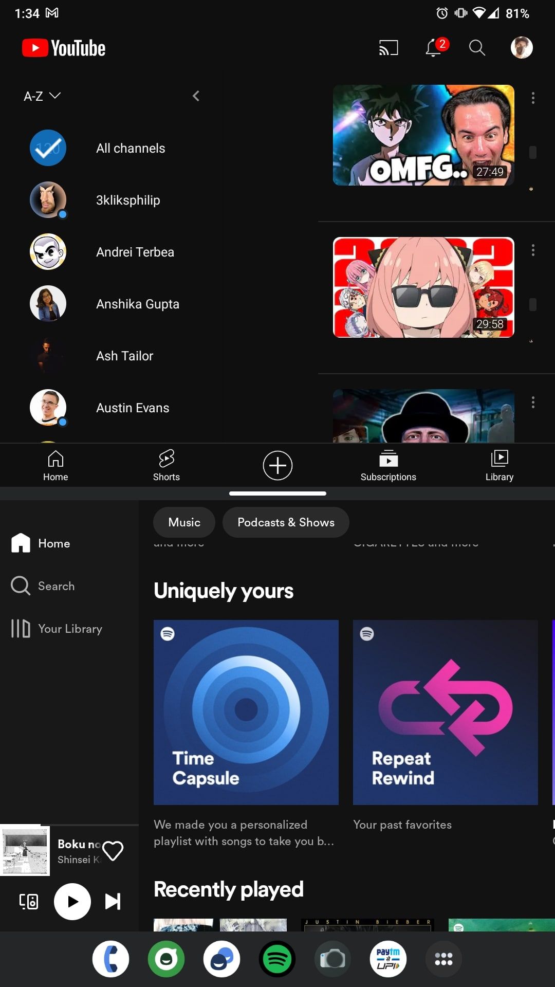 YouTube and Spotify apps in a split-screen layout