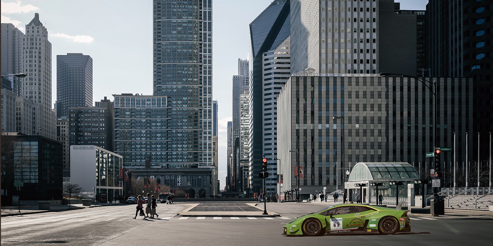Cover of a sportscar driving down a city street
