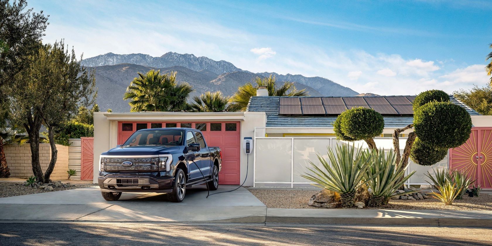 F-150 Lightning connected to a home charger 