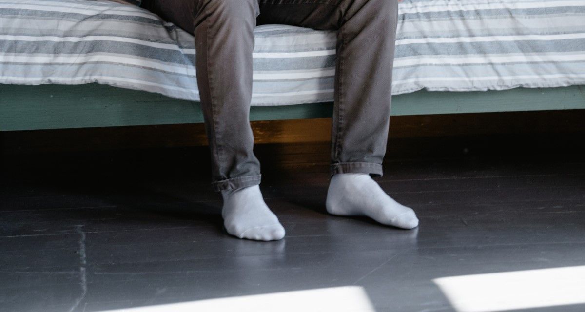 feet near bed