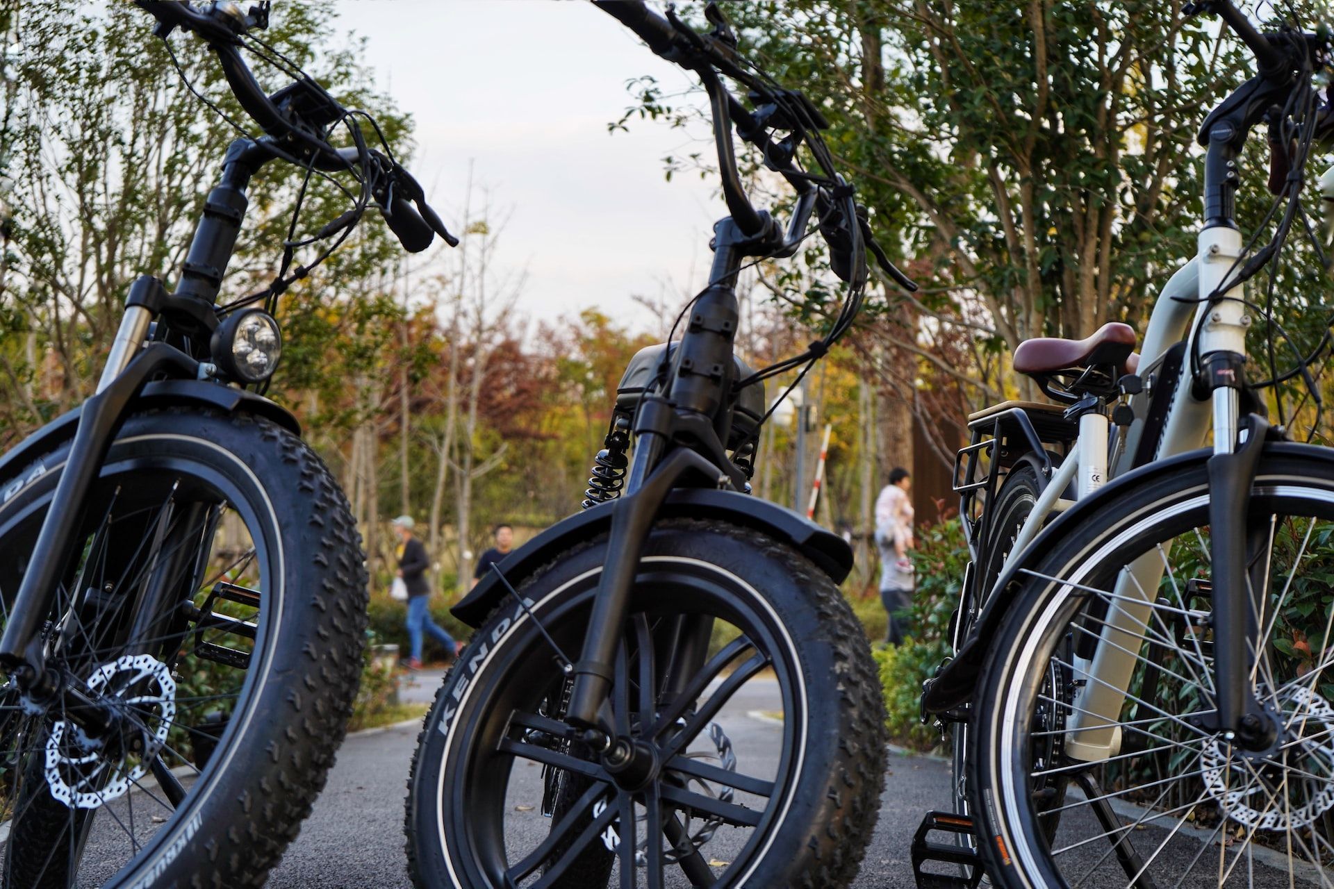Close-up shot of three ebikes parked besides one another