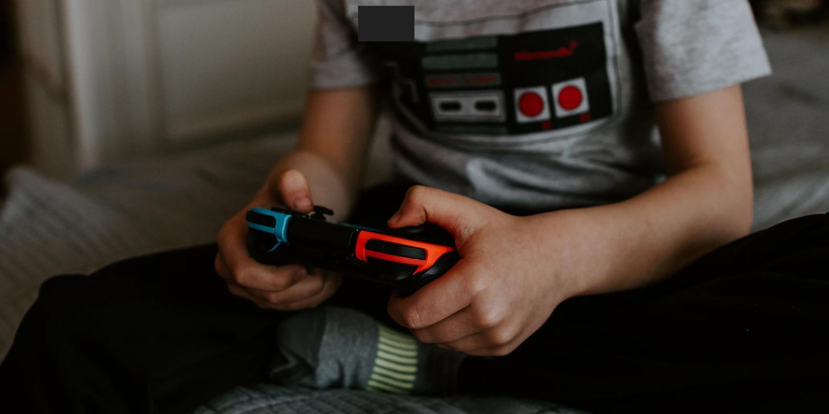 Kid Playing Nintendo Switch Online with NES controller Tshirt