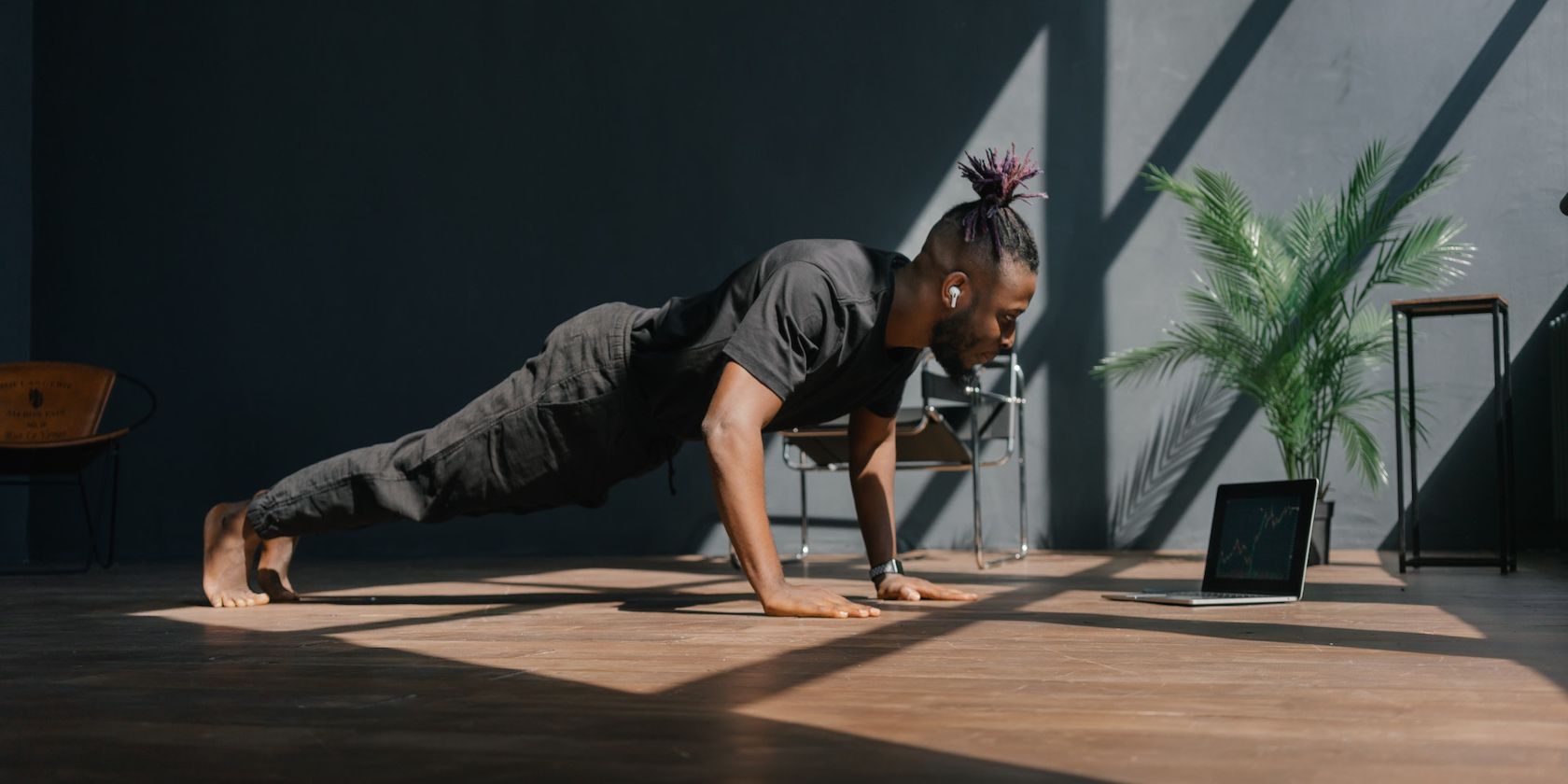 man following online push ups workout