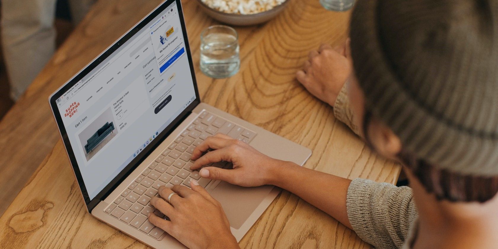 Person Typing on a Windows 11 Laptop