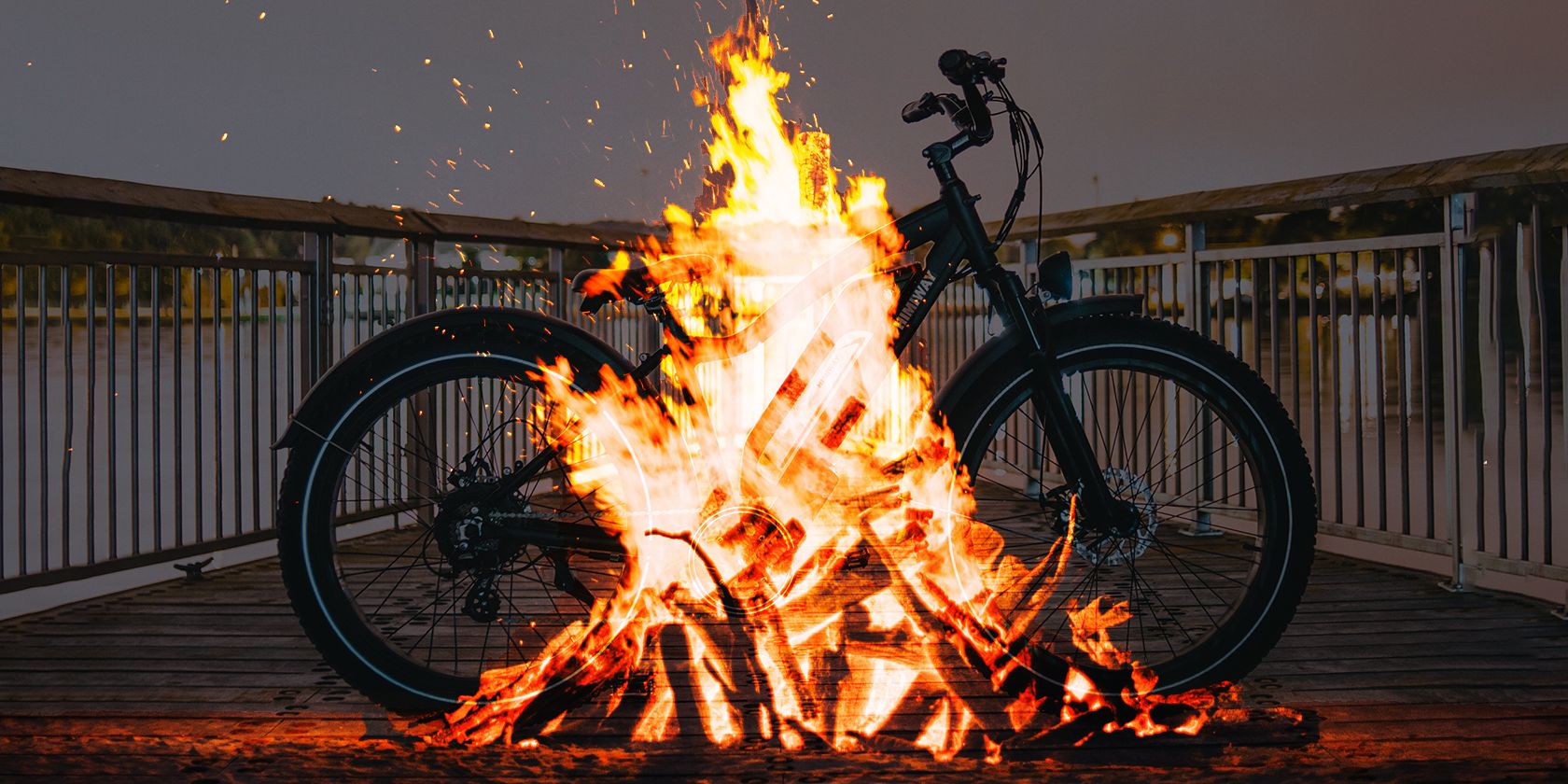 photograph of a fire superimposed on an e-bike parked on a deck