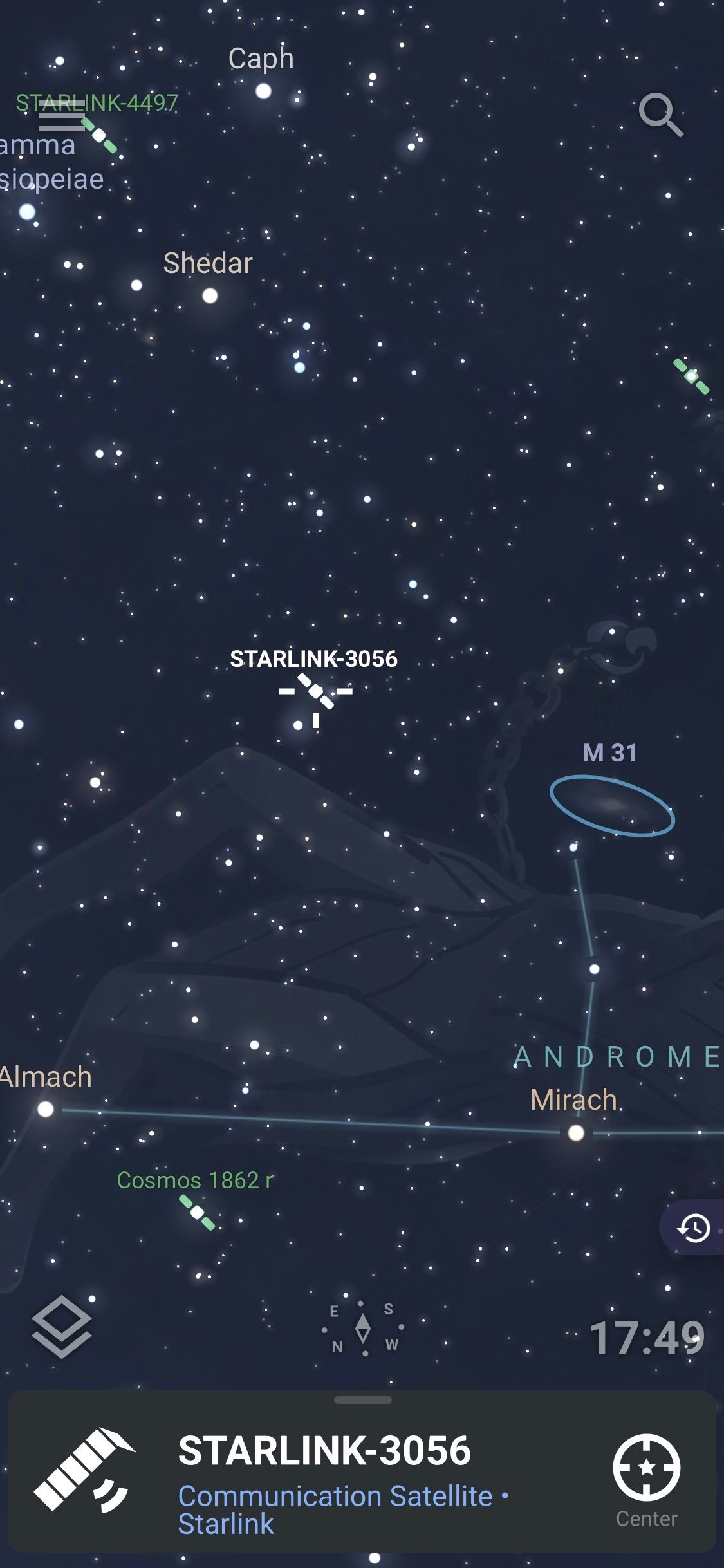 Screenshot of Stellarium app showing planetarium view with satellite locations