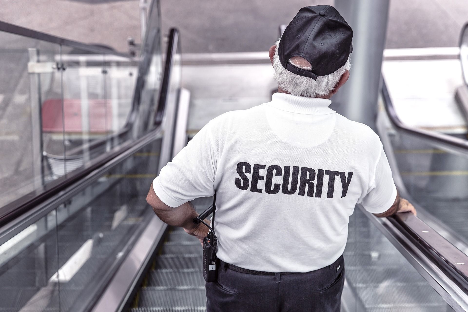 Security man escalator police