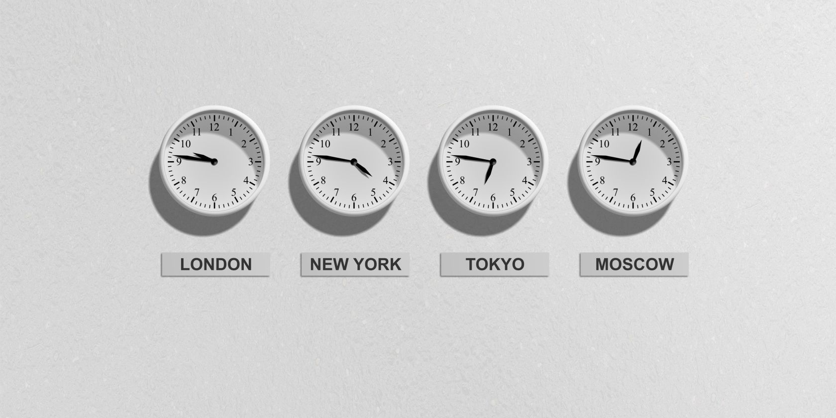 Four Time Zone Clocks, White Background