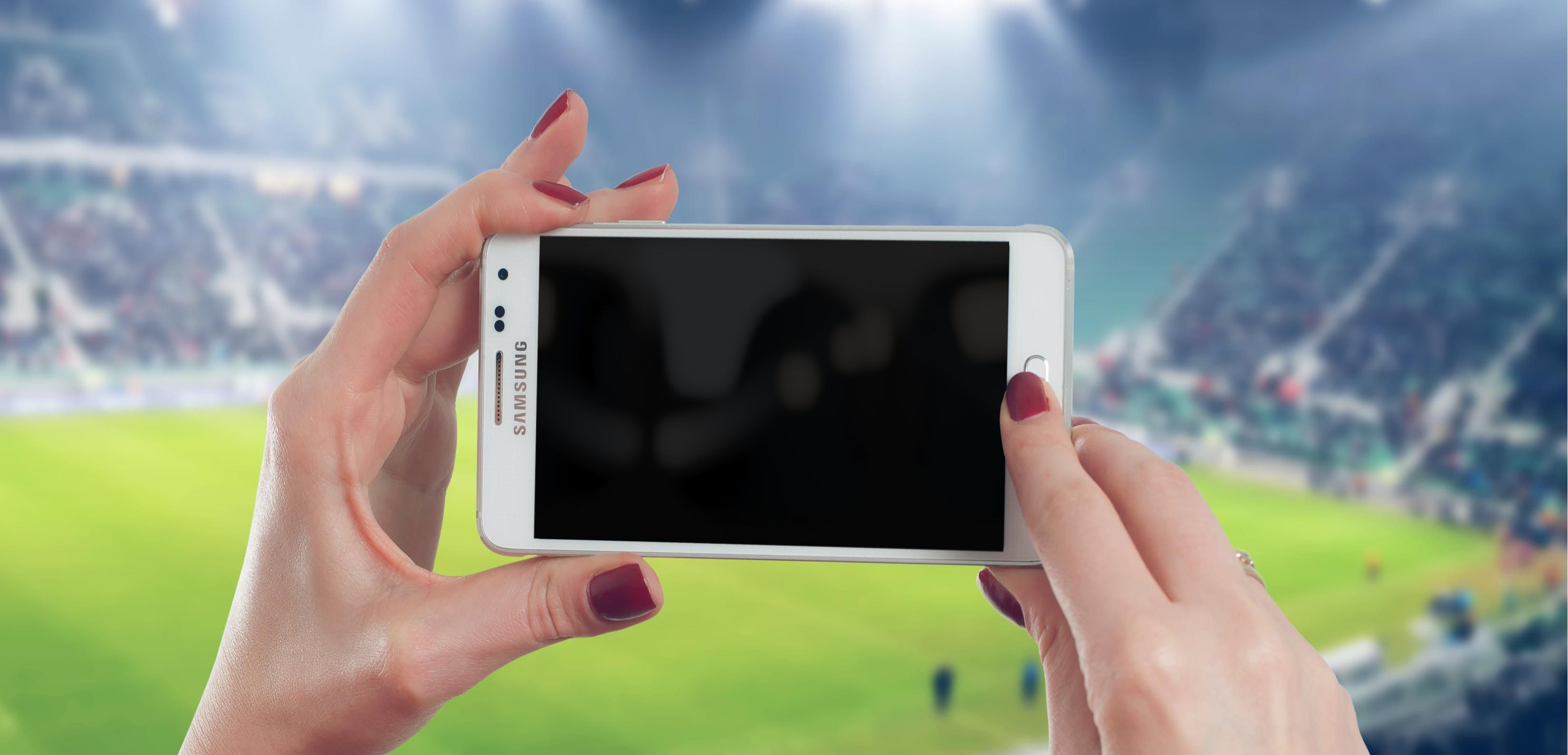 Woman Taking a Picture on a Football Field But Camera Is Black on Android
