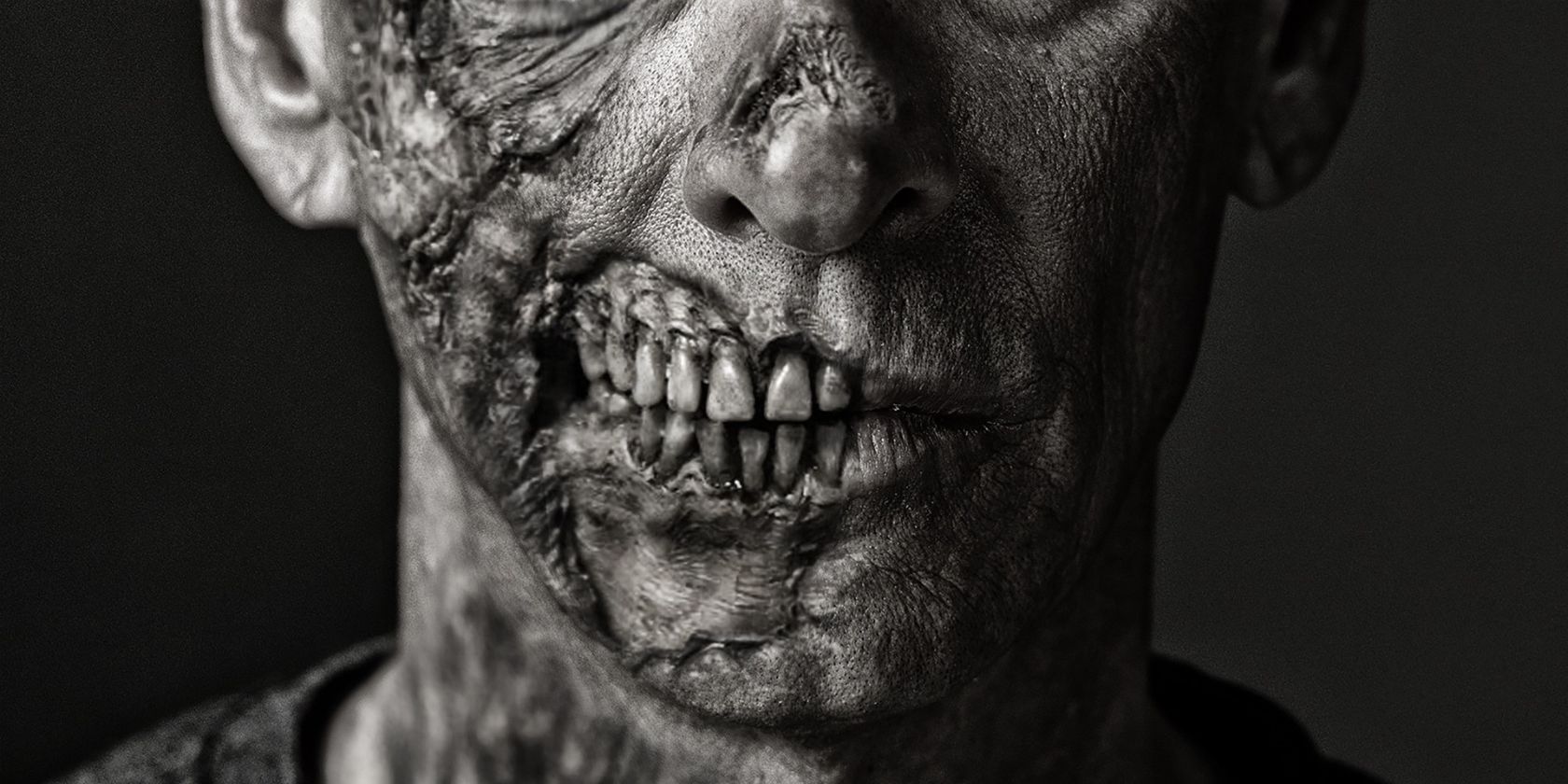A close up of a zombified face