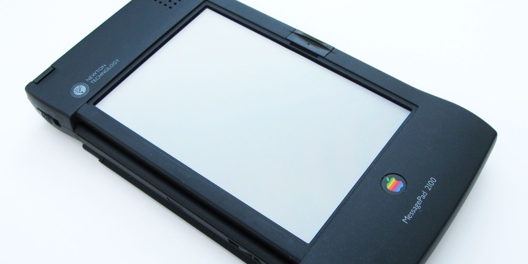 Apple Newton with a blank screen on a blank background