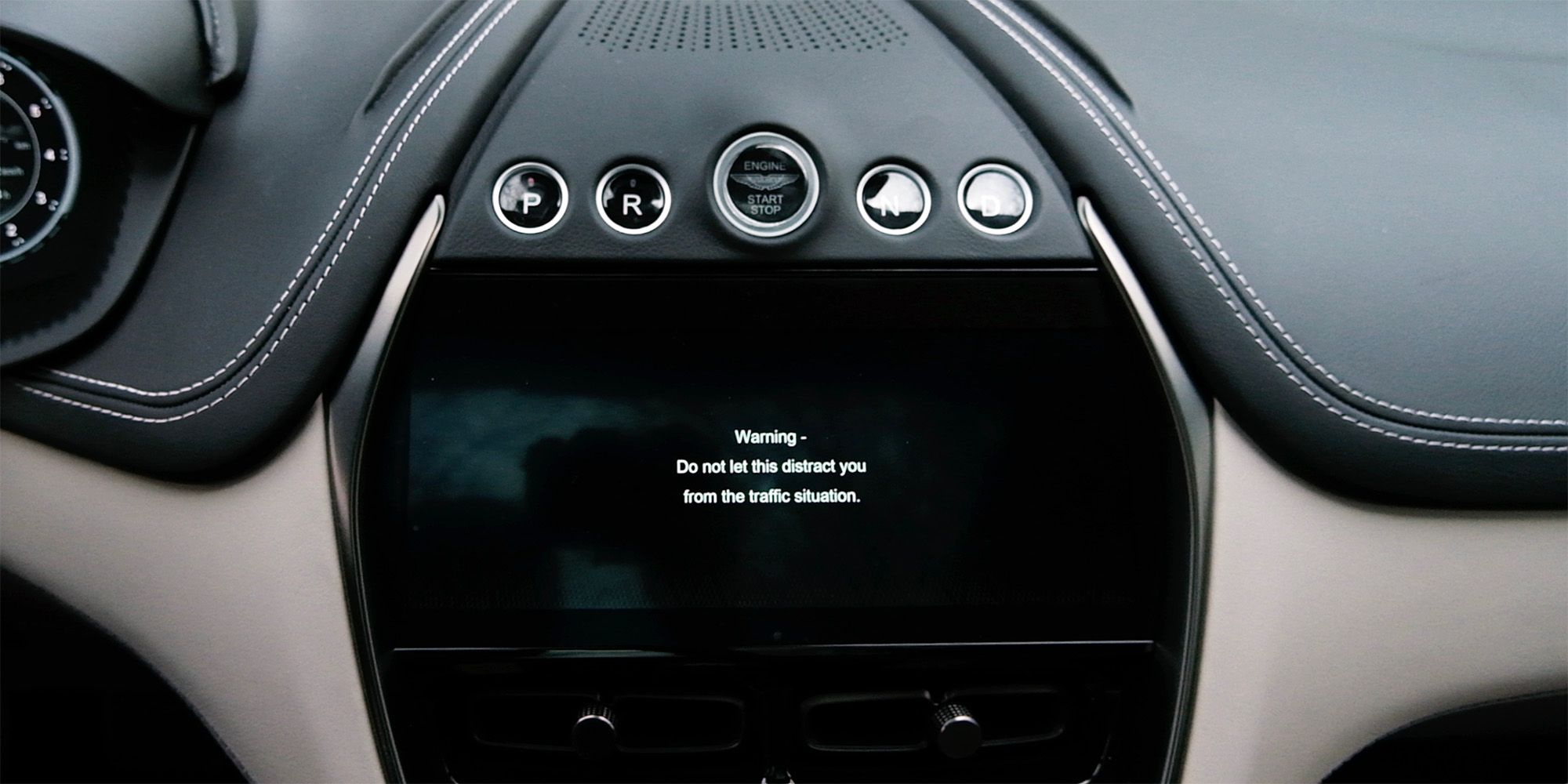 Aston Martin DBX infotainment screen and transmission buttons