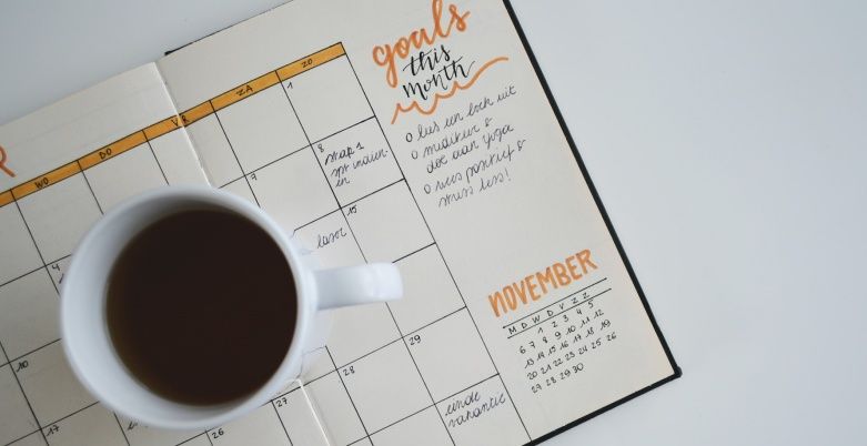 Coffee cup placed on a calendar