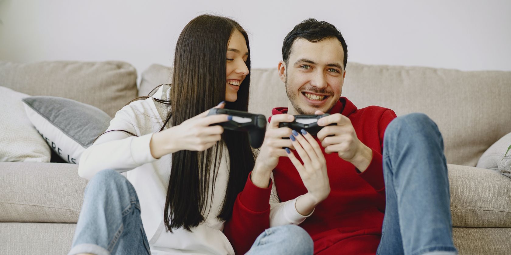Couple Gaming Together in Living Room