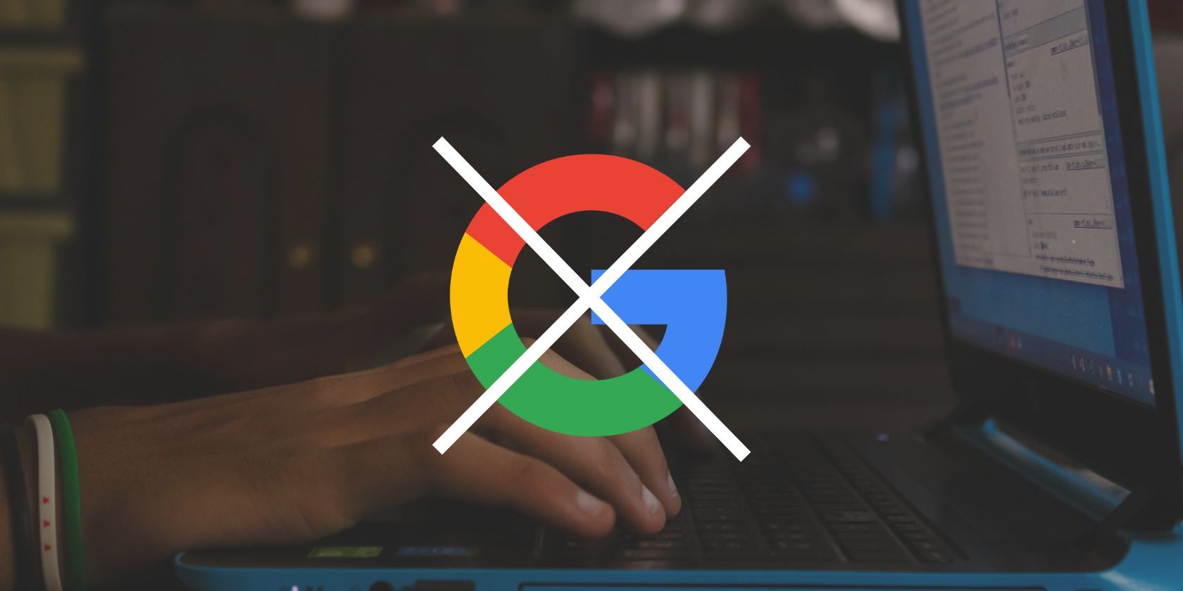 An image of the Google logo crossed out in with an image of a person typing on a laptop as the background