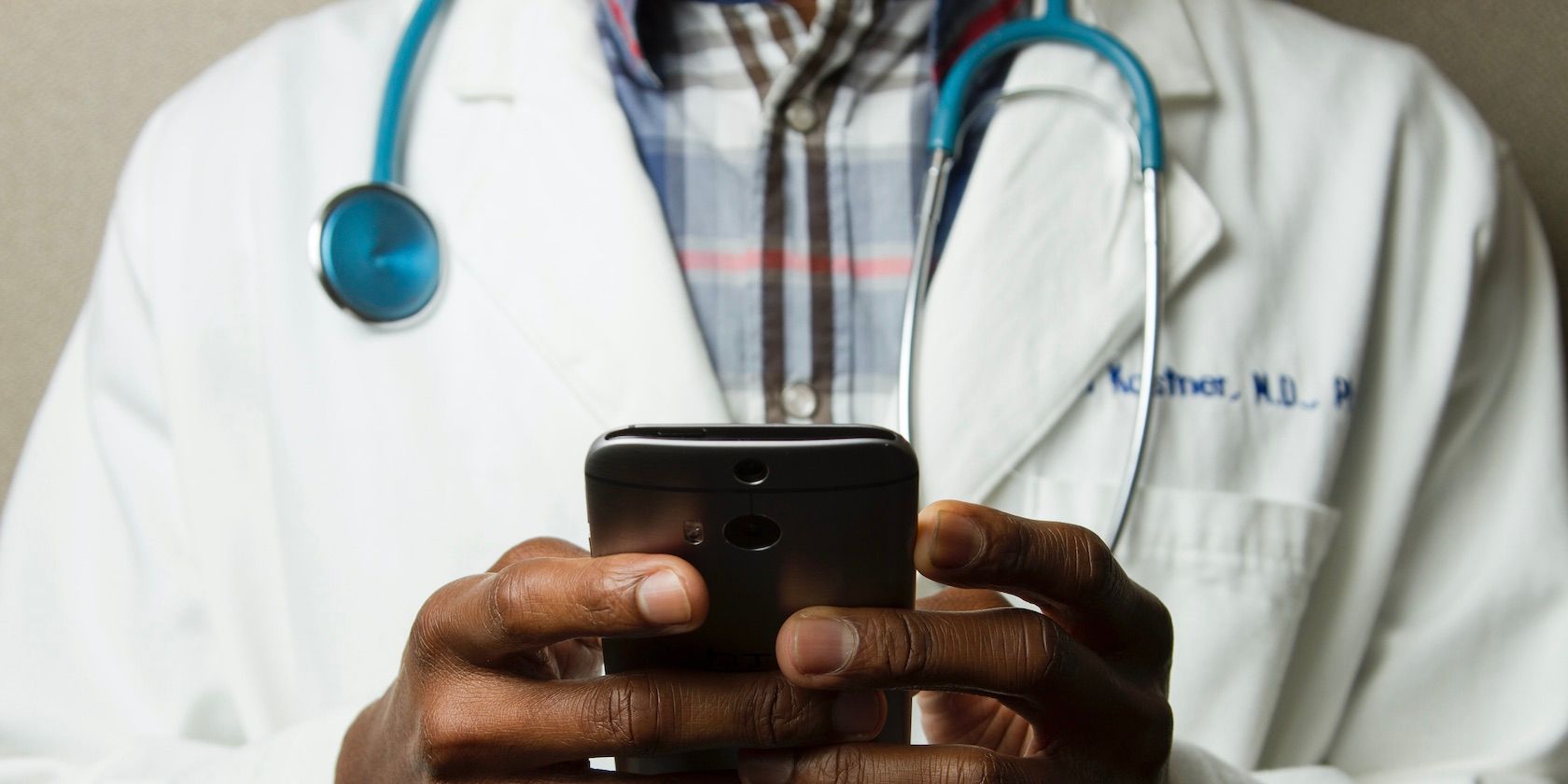 doctor holding smartphone